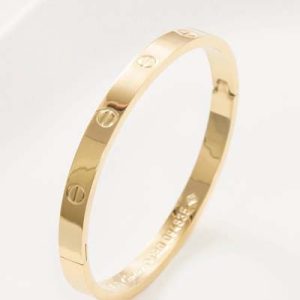 دستبند کارتیه لاو استیل مدل گرد طلایی